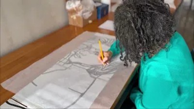 Artist Ghada Is Creating Cardboard Girl Sculpture